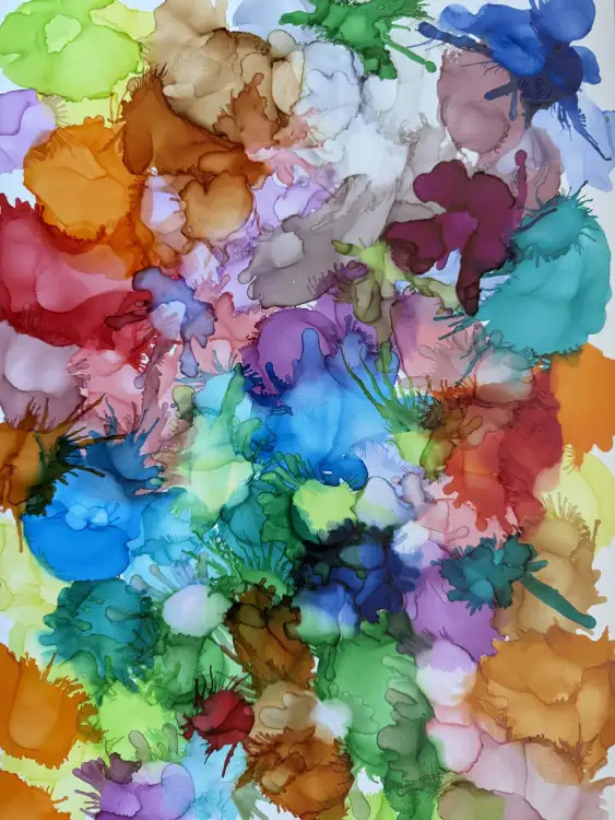 My first attempt at an alcohol art painting, with many colorful shapes blending into each other.