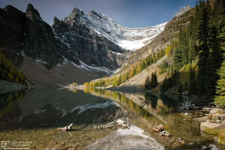 Lake Agnes is a beautiful alpine lake in Banff National Park, Alberta, set inside a cirque formed by the peaks of Mt. Saint Piran, Mt. Niblock, and Mt. Whyte.