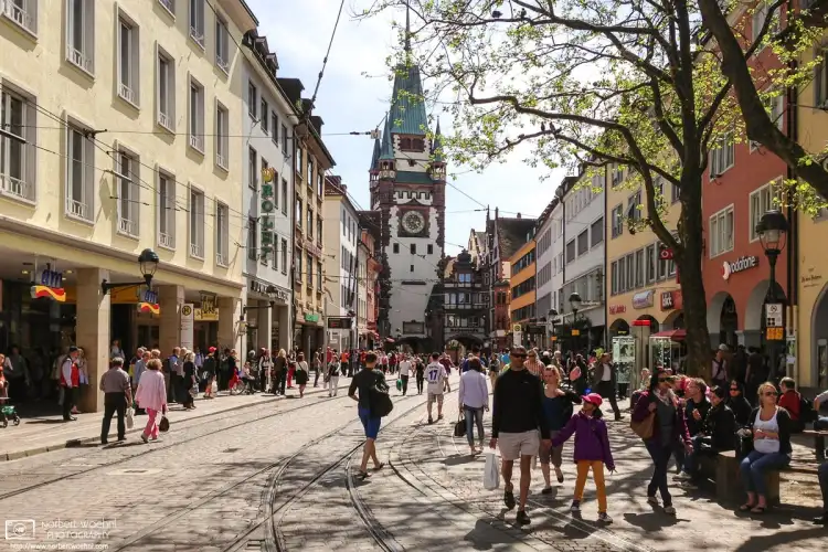 View towards Martinstor (Martins Gate) in the city center of Freiburg im Breisgau, Germany.
