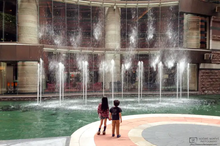 Kids watching the Musical Fountain at the Canal City Hakata Shopping district in Fukuoka, Japan.