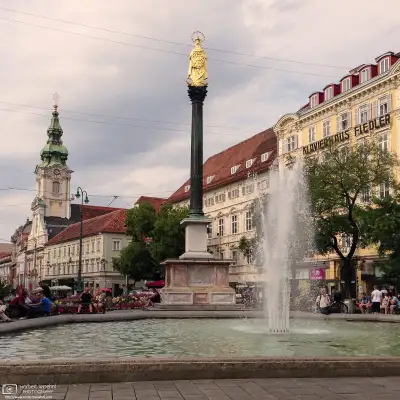 City Parish Church, St. Mary's Column and Fountain at Am Eisernen Tor in Graz, Austria.