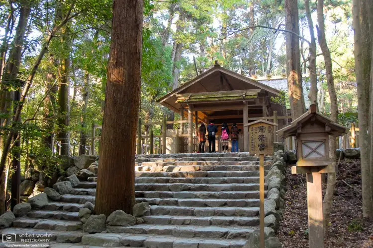 Visitors are praying at Aramatsuri-no-miya, an affiliated shrine inside Ise Jingu in Mie Prefecture, Japan.