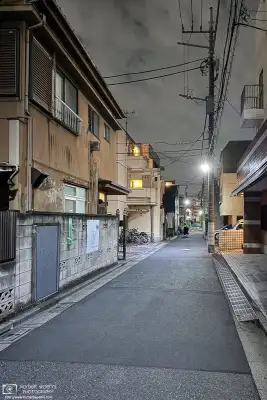 Night photo from a quiet backstreet in the Azusawa district of Itabashi Ward of Tokyo, Japan.