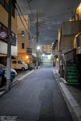 Night photo from a quiet backstreet in the Azusawa district of Itabashi Ward of Tokyo, Japan.