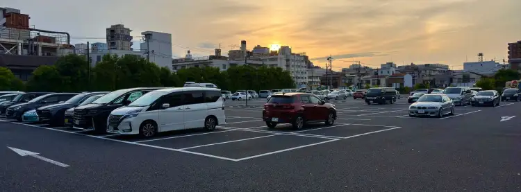 Sunset behind a suburban parking lot in the Itabashi Ward of Tokyo, Japan.