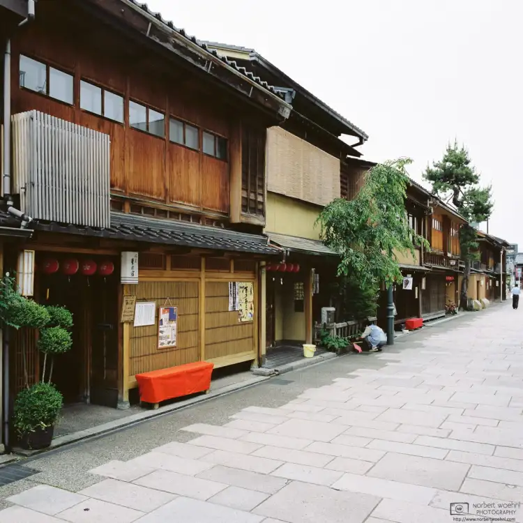 View along a line of historic buildings in the Nishi Chayagai district of Kanazawa in Ishikawa Prefecture, Japan.