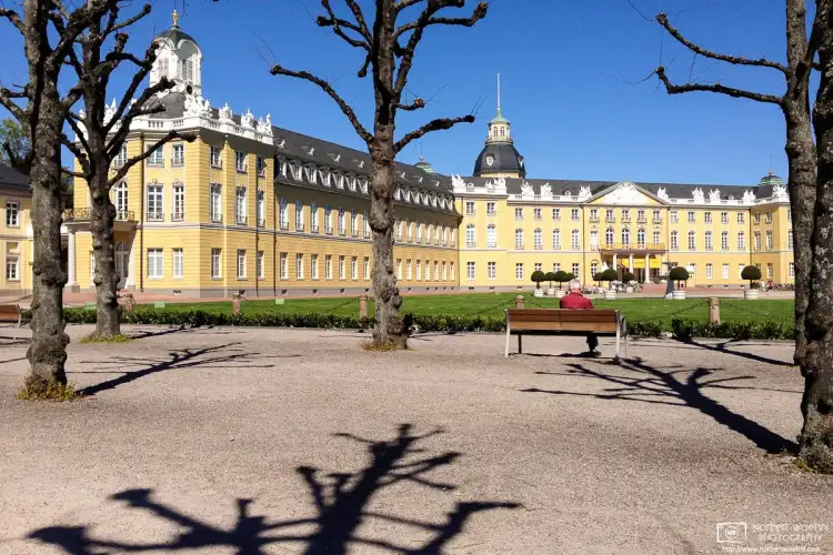 Enjoying the view towards Schloss Karlsruhe (Karlsruhe Palace) on a fine spring day in this southwest-German city.