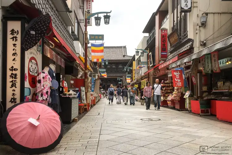 A scene from the shop-lined approach road to Kawasaki Daishi (Heiken-ji) Temple in Kawasaki, Japan.