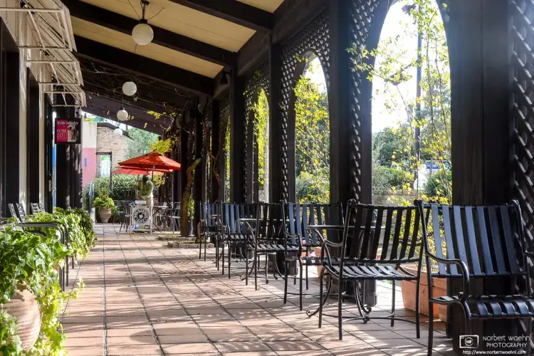 View of a restaurant patio in a quiet corner of the Mosaic Shopping Center at Harborland in Kobe, Japan.