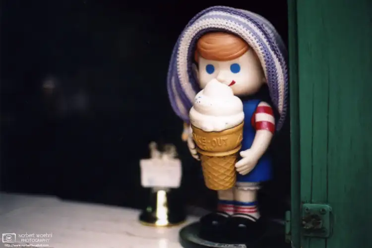 Walking around the Kitano Ijinkan area of Kobe, Japan, I discovered this mascot inside an ice cream stall.