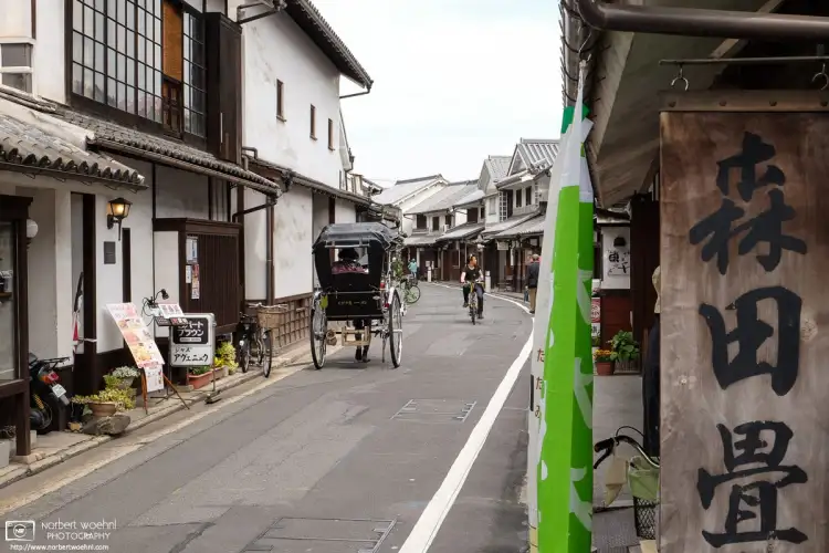Light traffic in a side street of the historic Bikan District of Kurashiki in Okayama Prefecture, Japan.