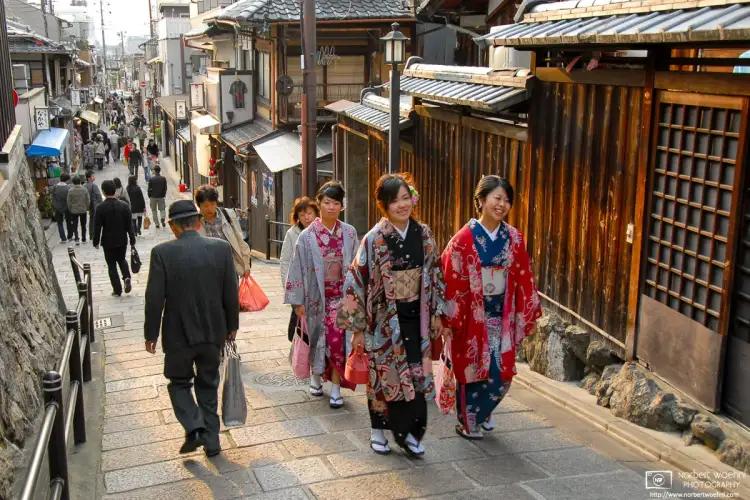 On a stroll around the Higashiyama area of Kyoto, Japan, I ran into these three young women in kimono as they were walking up the street to Yasaka Pagoda.