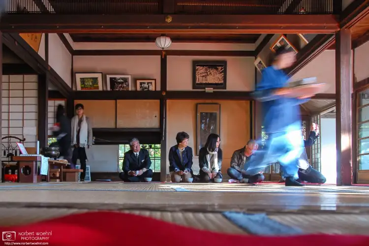 Temple staff rushing to serve Green Tea and Japanese Sweets at Hosenin Temple in the beautiful Ōhara area of Northern Kyoto, Japan.