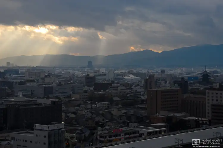 During an autumn afternoon rain, I was able to capture this view of Kyoto, roughly overlooking the area to the southwest of Kyoto Station.