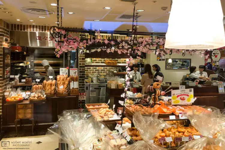 A glimpse through the window of Shinshindo Bakery Shop in the PORTA Shopping Mall underneath Kyoto Station, Japan.