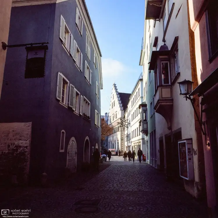 Walking along Ludwig Street in Lindau, Germany, towards the old City Hall.