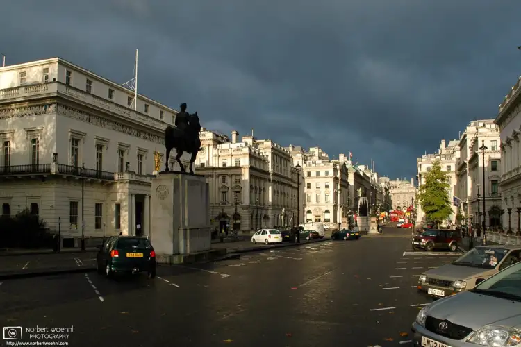 Extraordinary light after a rain shower on Pall Mall, a historic street with fashionable residences in Westminster, London.