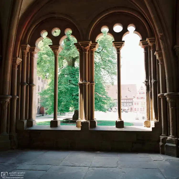A view through two stone arches of the 13th Century Monastery Church Entrance Hall at Maulbronn Monastery in Southwestern Germany.
