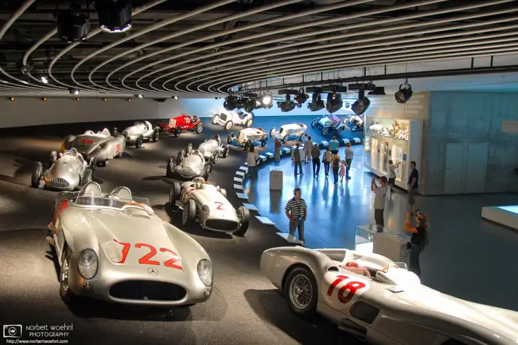 This motor sports history display at the Mercedes-Benz Museum in Stuttgart, Germany, features some of their famous Silver Arrow (Silberpfeil) cars.