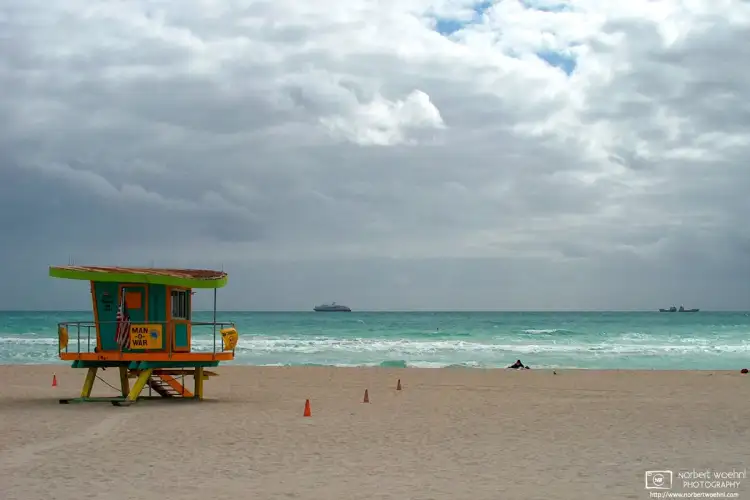 A colorful lifeguard tower captured during some moody weather in Miami Beach, Florida.