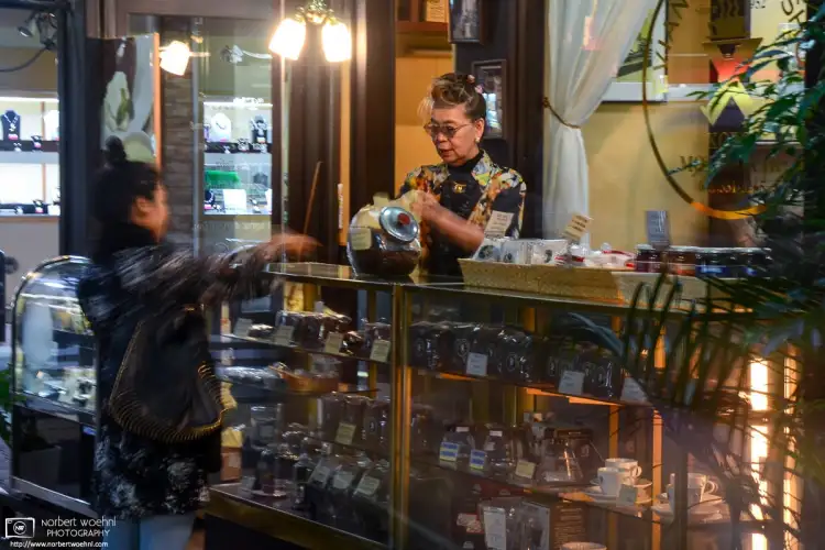 In a side corner of the Motomachi Shopping Street in Kobe, Japan, I saw this scene at Evian Coffee, a shop established in the early 1950s.