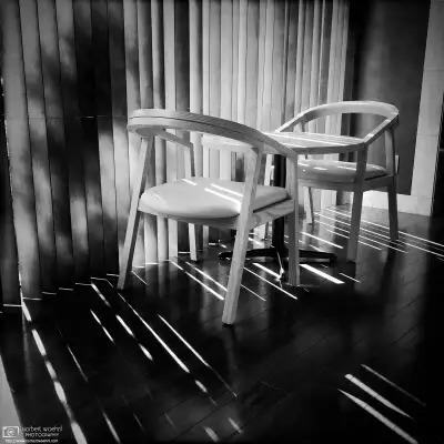 At a hotel lobby in Nagano, Japan, sunlight falling through the blinds is creating patterns on the interior decoration.
