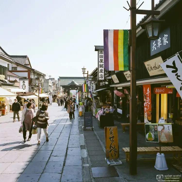 Nakamise-dori, the approach to the iconic Zenkōji Temple in Nagano, Japan, is a quaint street bustling with small shops and local specialties.