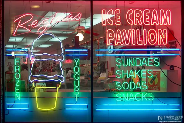 Taken on a Florida trip in 2004, this is an evening view into Reginas Ice Cream Pavilion on Fifth Avenue in Naples, FL.