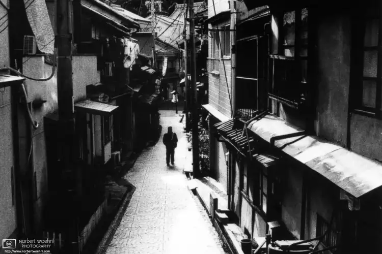 A lone walker in the old town of Onomichi in Hiroshima Prefecture, Japan.