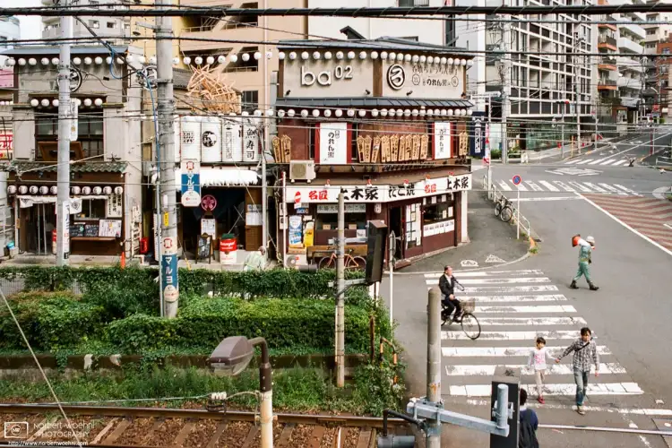 Old Restaurants around Ōtsuka Station in Tokyo, Japan. The train tracks belong to the Toden Arakawa Line that was re-branded as Tokyo Sakura Tram in 2017.