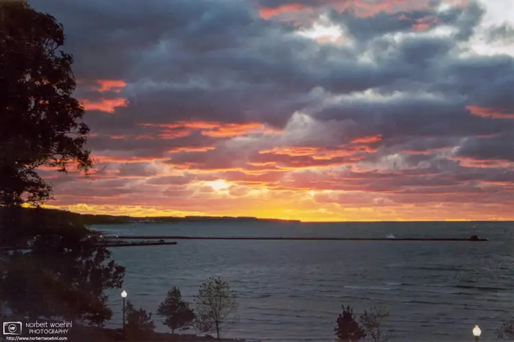 View of Little Traverse Bay from the aptly-named Sunset Park in Petoskey, one of the northernmost cities on the Lower Peninsula of Michigan.