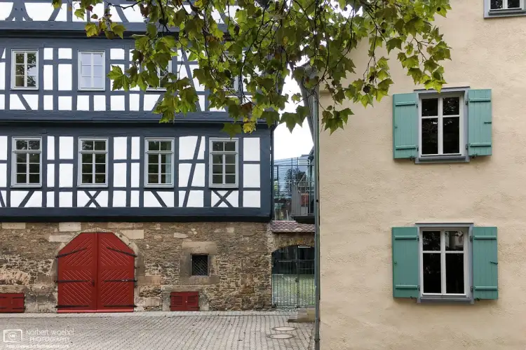 Old architecture at Friedrich-List-Gymnasium in the southwest-German city of Reutlingen. The half-timbered structure on the left dates back to the 16th century.