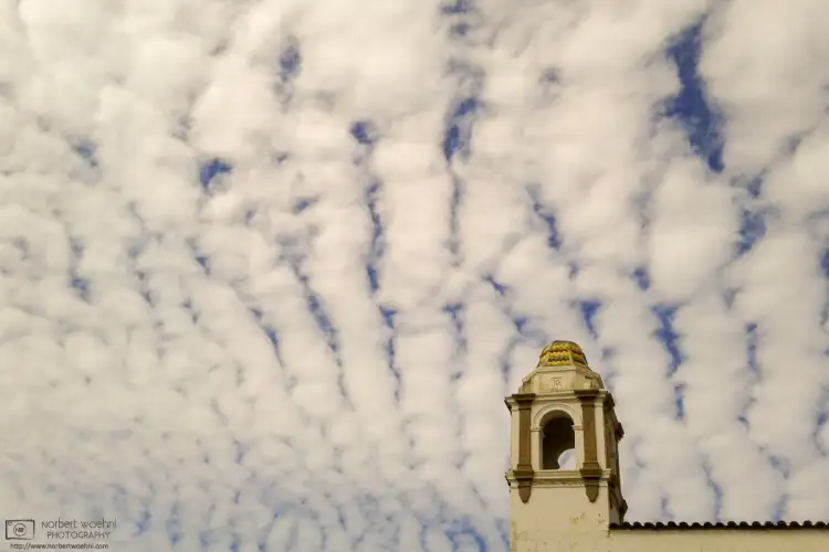 An architectural detail on Beach Street in Santa Cruz, California, against a fantastic sky.