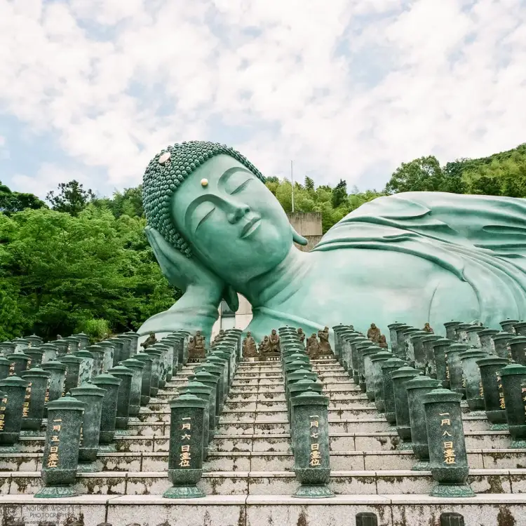 The Reclining Buddha statue at Nanzoin Temple in Sasaguri, Fukuoka Prefecture, Japan. At 41 meters long, 11 meters high, and weighing in at nearly 300 tons, it is said to be the biggest bronze statue in the world.