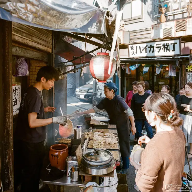 Scene from a Yakitori Stand in the traditional Shibamata area in the northeast of Tokyo, Japan.