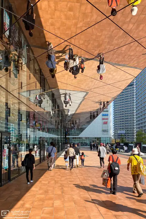 Window and ceiling reflections at Ariake Garden, a shopping, dining and entertainment complex in Tokyo Bay, Japan.