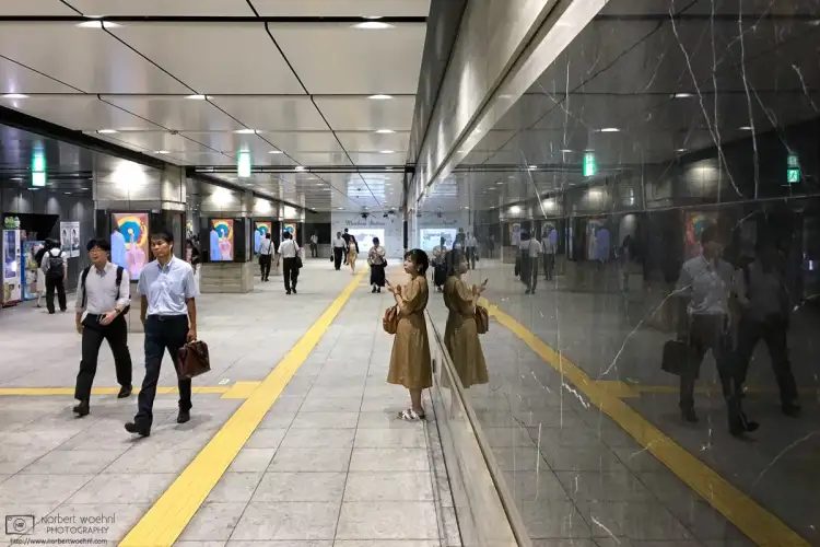 A workday evening scene taken in the underground concourse of Otemachi Station in Tokyo, Japan.
