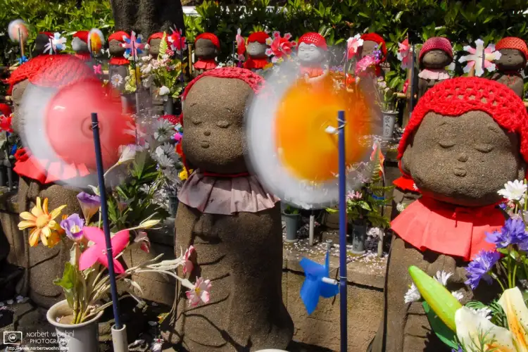 Jizo Statues at Zojoji Temple in Tokyo, Japan. Jizō is seen as the guardian of children.