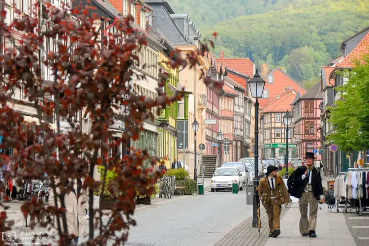 Traveling carpenter journeymen are walking the streets of the old city of Wernigerode, Germany.