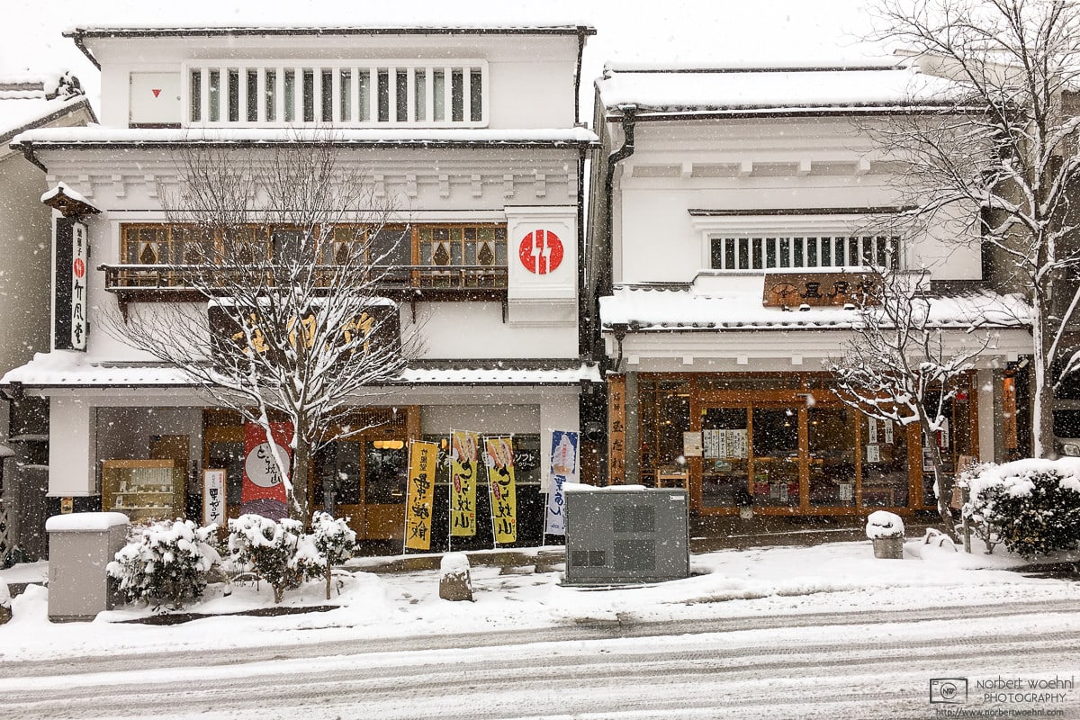 A winter impression outside some traditional shops in the northern part of Chūō Dōri in Nagano, Japan.